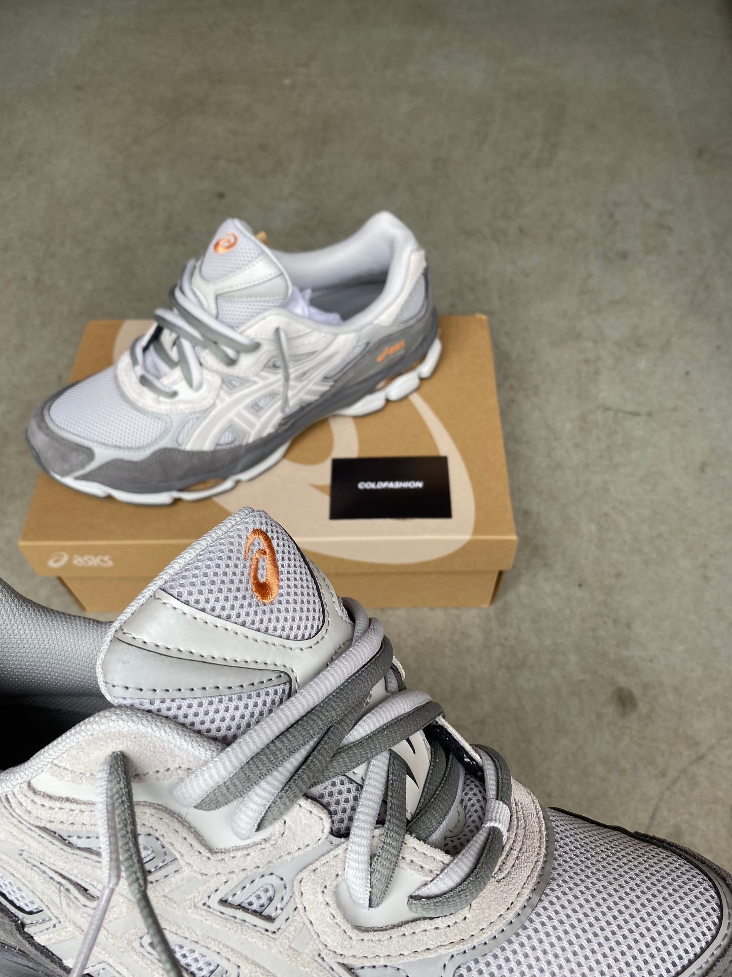 ASICS “cement grey”